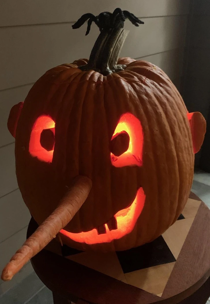 13. “My dad’s pumpkin carving has a lot of personality!”